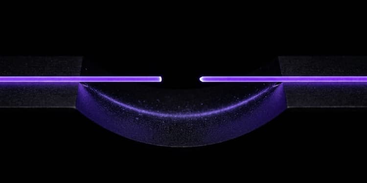 A broken violet line across black, its severed ends bridged from below by a fainter violet arc