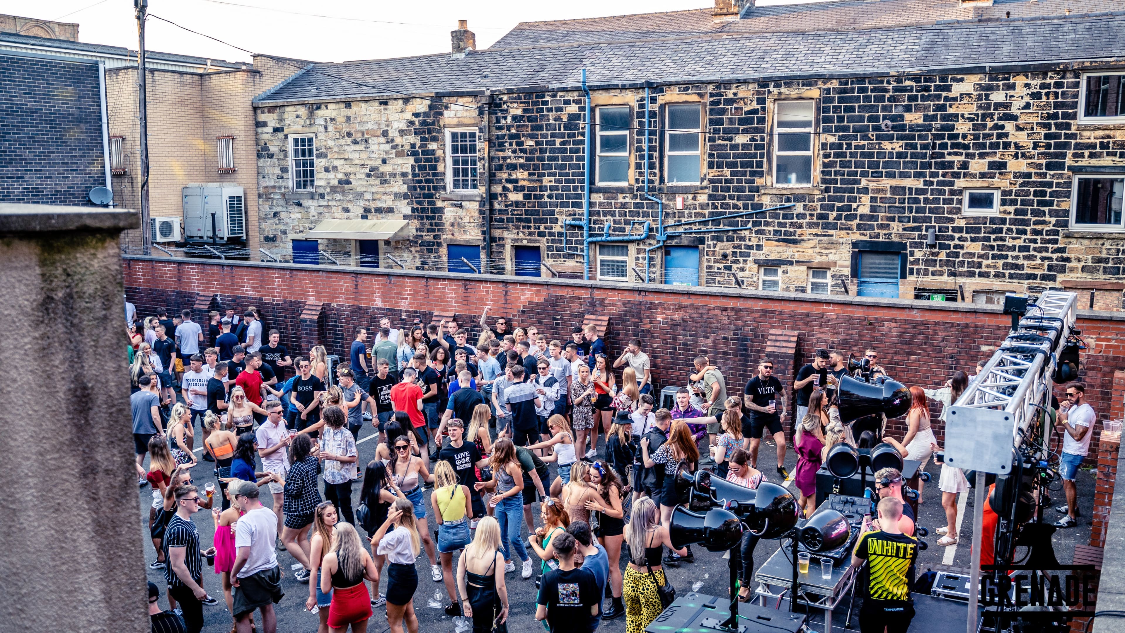 Crowd at a Grenade daytime rooftop event, 2015